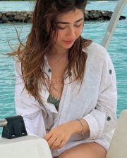 Breezy Actress Aditi Bhatia in a Green Bikini With Open White Shirt Photos 01