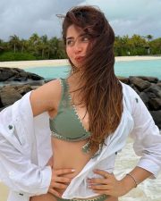 Breezy Actress Aditi Bhatia in a Green Bikini With Open White Shirt Photos 02