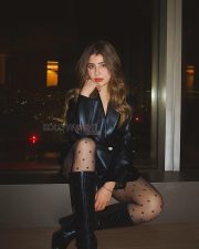 Seductive Actress Aditi Bhatia in a black leather blazer dress and polka dot tights photos 01