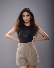 Beautiful Donal Bisht in a Black Crop Top and Shorts Photos 01
