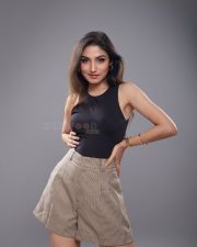 Beautiful Donal Bisht in a Black Crop Top and Shorts Photos 02