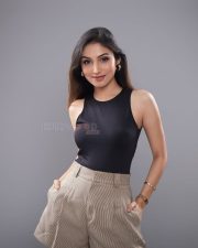 Beautiful Donal Bisht in a Black Crop Top and Shorts Photos 03