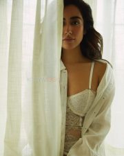 Bold Jonita Gandhi in a White Lace Floral Corset Top with White Lace Panties and Thigh High Fishnet Stocking Photos 02 Bold Jonita Gandhi in a White Lace Floral Corset Top with White Lace Panties and Thigh High Fishnet Stocking Photos 02