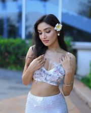 Enchanting Actress Donal Bisht in a White Butterfly Crop Top Photos 02