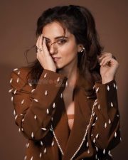 Glam Riddhi Dogra in a Chocolate Colored Top Photos 01
