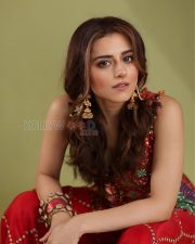 Vibrant Actress Riddhi Dogra in a Red Embroidered Sharara Set Photos 02