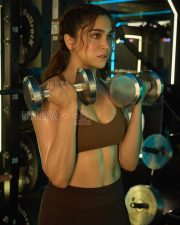 Athletic Actress Sharvari Wagh in a Brown Sports Bra Photos 01