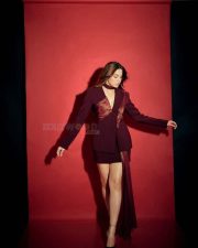 Enigmatic Actress Sharvari Wagh in a Burgundy Satin Blazer and Skirt Photos 05