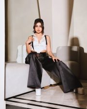 Gorgeous Tejasswi Prakash in a White Tuxedo Shirt and Black High Waisted Pants for the Hollywood Reporter Women in Power Event Photos 03