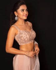 Hot and Beautiful Tejasswi Prakash in a Beige Lehenga Choli Photos 02