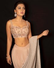 Hot and Beautiful Tejasswi Prakash in a Beige Lehenga Choli Photos 03