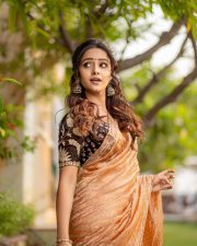 Love Me Actress Vaishnavi Chaitanya in an Orange Saree Pictures 02