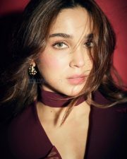 Magnetic Actress Sharvari Wagh in a Dark Burgundy Blazer with Choker Neckline Photos 03