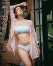 Sexy Model and Dancer Amy Aela in a Skimpy White Bikini with an Open Shirt Photos 03