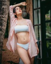 Sexy Model and Dancer Amy Aela in a Skimpy White Bikini with an Open Shirt Photos 03