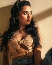 Sexy Tejasswi Prakash in a Corset Vest Top and Rugged Jeans Pictures 01