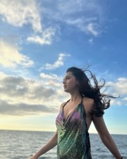 Sexy Tejasswi Prakash in a Shiny Halter Neck Dress Vacation Photos 02