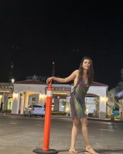 Sexy Tejasswi Prakash in a Shiny Halter Neck Dress Vacation Photos 04