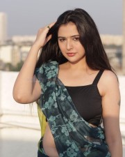 Sexy Vedvika Soni in a Embroidered Satin Half Saree with Black Crop Top Blouse Photos 04