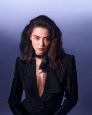 Best Dressed Beauty Surveen Chawla in a Black Blazer with a Plunging V Neckline with a Sheer Black Scarf Photos 02