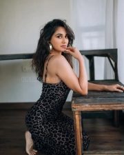 Gul Gule Bakawali Actress Nikita Dutta in a Black Leopard Print Slip Dress with Thin Spaghetti Straps Photos 04