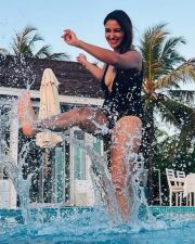 Hot and Erotic Nikita Dutta Boobs Cleavage in an One Piece Swimsuit Photos 02