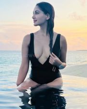 Hot and Erotic Nikita Dutta Boobs Cleavage in an One Piece Swimsuit Photos 03