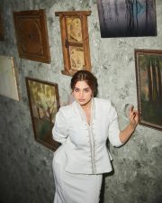 Manamey Heroine Ayesha Khan in a White Peplum Blazer Top and Long Fitted Skirt Photos 03