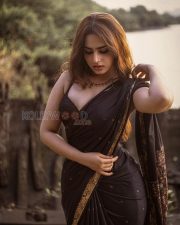 Mesmerizing Actress Ayesha Khan in a Black Saree with Gold Border Photos 04