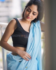Radiant Actress Sanya Thakur in a Light Blue Saree with Black Blouse Photos 01