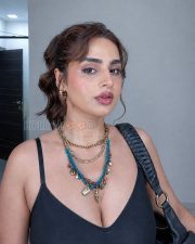 Seductive Ayesha Khan Cleavage in a Black Deep V neck Camisole Photos 02