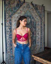 Sexy Nikita Dutta in a Pink Bralette and Blue Denim Jeans Photos 02