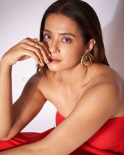 Spellbinding Surveen Chawla in a Red Strapless Dress Pictures 04 Spellbinding Surveen Chawla in a Red Strapless Dress Pictures 04