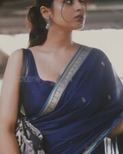 Stylish Ayesha Khan in a Sleeveless Blouse Saree Photos 01
