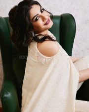 Actress Raveena Tandon in a White Ensemble Photos 01