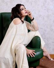 Actress Raveena Tandon in a White Ensemble Photos 03