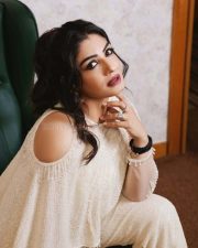 Actress Raveena Tandon in a White Ensemble Photos 04