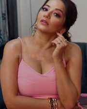 Bhojpuri Actress Asli Monalisa in a Pink Deep Neck Bodycon Dress Photos 03