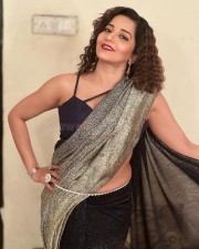 Bhojpuri Actress Monalisa Stunning in a Glittery Saree and Deep Neck Blouse Pictures 04