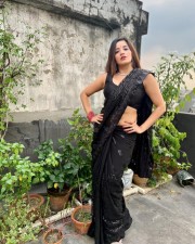 Bhojpuri Actress Monalisa in a Black Sequin Saree Pictures 04