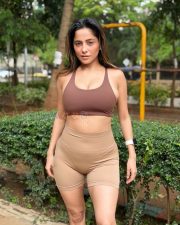 Confident Actress Kate Sharma in a Brown Sports Bra Tan High Waist Biker Shorts White Sneakers Photos 03 Confident Actress Kate Sharma in a Brown Sports Bra Tan High Waist Biker Shorts White Sneakers Photos 03