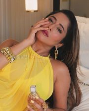 Eye Catching Kate Sharma Legs in a Yellow Sheer Halter Mini Dress Photos 02