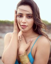 Gangi Gangi Actress Anaira Gupta in a Turquoise Blue Satin Midi Slip Dress with Thin Spaghetti Straps Photos 01