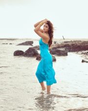 Gangi Gangi Actress Anaira Gupta in a Turquoise Blue Satin Midi Slip Dress with Thin Spaghetti Straps Photos 09
