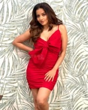 Glam Monalisa in a Red Hot Mini Dress With Plunging Neckline Photos 02