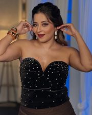 Glamorous Bhojpuri Actress Asli Monalisa in a Black Strapless Mini Dress Pictures 03