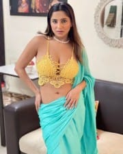 Glamorous Kate Sharma in a Blue Saree and Deepneck Bralette Top Photos 02