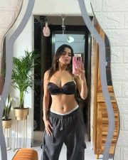 Hot Kate Sharma Cleavage in a Black Bra with White Straps and Cargo Pants Photos 01