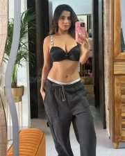 Hot Kate Sharma Cleavage in a Black Bra with White Straps and Cargo Pants Photos 03