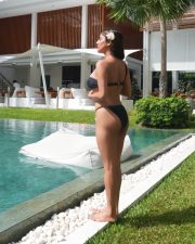 Hot Kate Sharma in a Black String Strapless Bikini with a Floral Accent and Minimalist Thong Photos 07